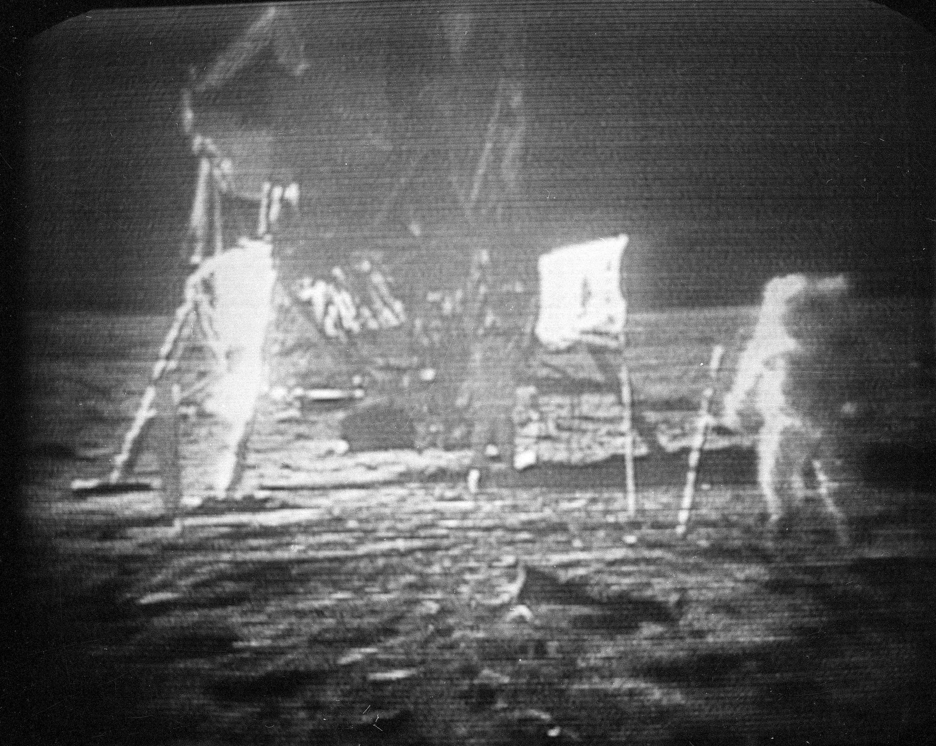 FILE - In this July 20, 1969 file photo, Apollo 11 astronaut Neil Armstrong, right, trudges across the surface of the moon leaving behind footprints. The National Air and Space Museum is launching a crowdfunding campaign to conserve the spacesuit Neil Armstrong wore on the moon. The campaign begins Monday, marking 46 years since Armstrongs moonwalk in 1969. Conservators say spacesuits were built for short-term use with materials that break down over time. The museum aims to raise $500,000 on Kickstarter to conserve the spacesuit, build a climate-controlled display case and digitize the spacesuit with 3D scanning.  (AP Photo, file) (AP)