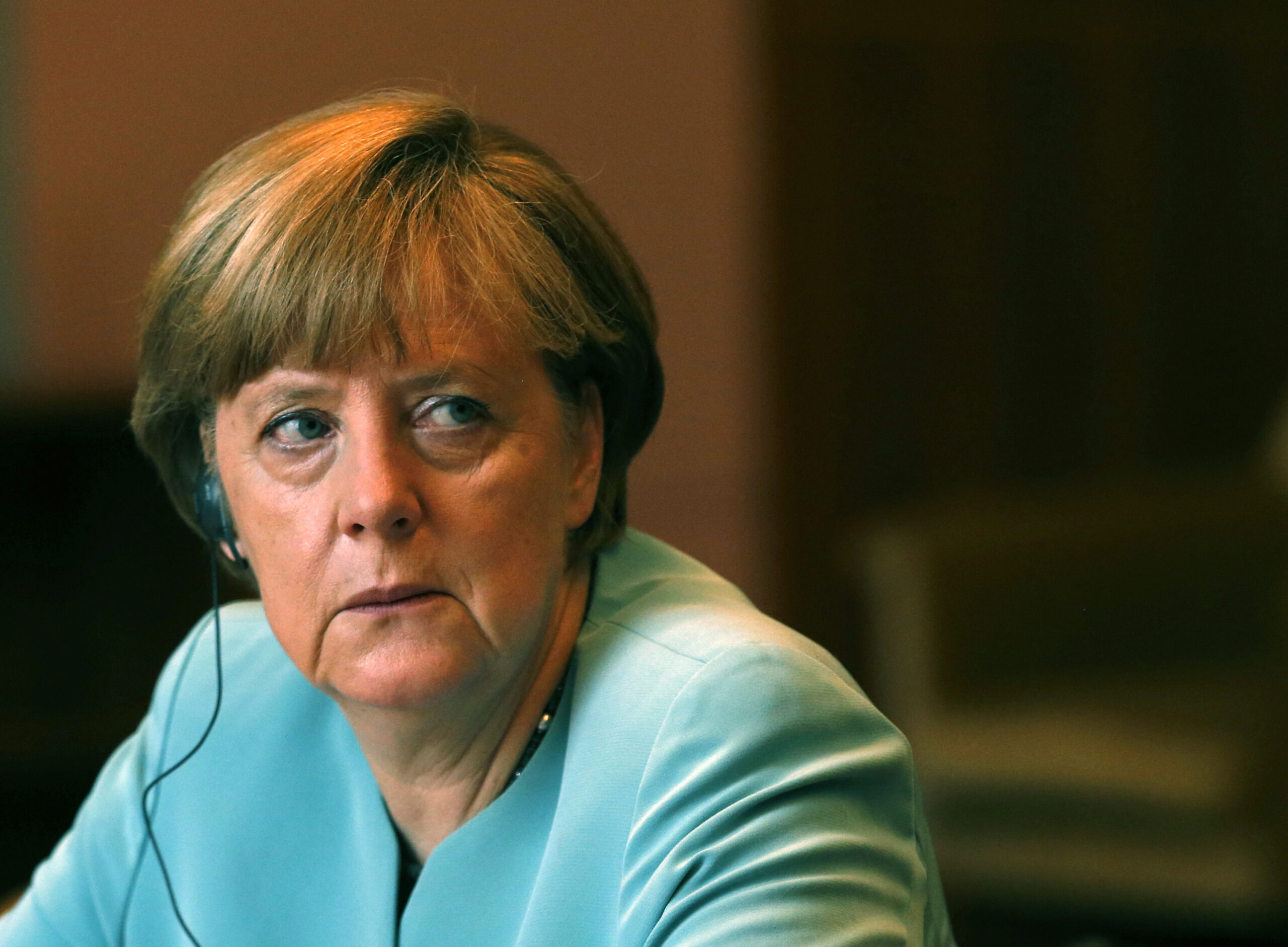 German Chancellor Angela Merkel listens Serbian President Tomislav Nikolic in Belgrade, Serbia, Thursday, July 9, 2015. (AP Photo/Darko Vojinovic) (Darko Vojinovic)