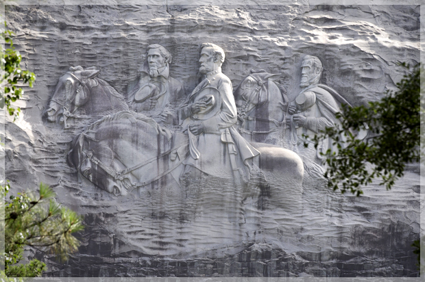 The carving depicting Stonewall Jackson, Robert E. Lee and Jefferson Davis, in Stone Mountain, Ga. (AP/John Bazemore)