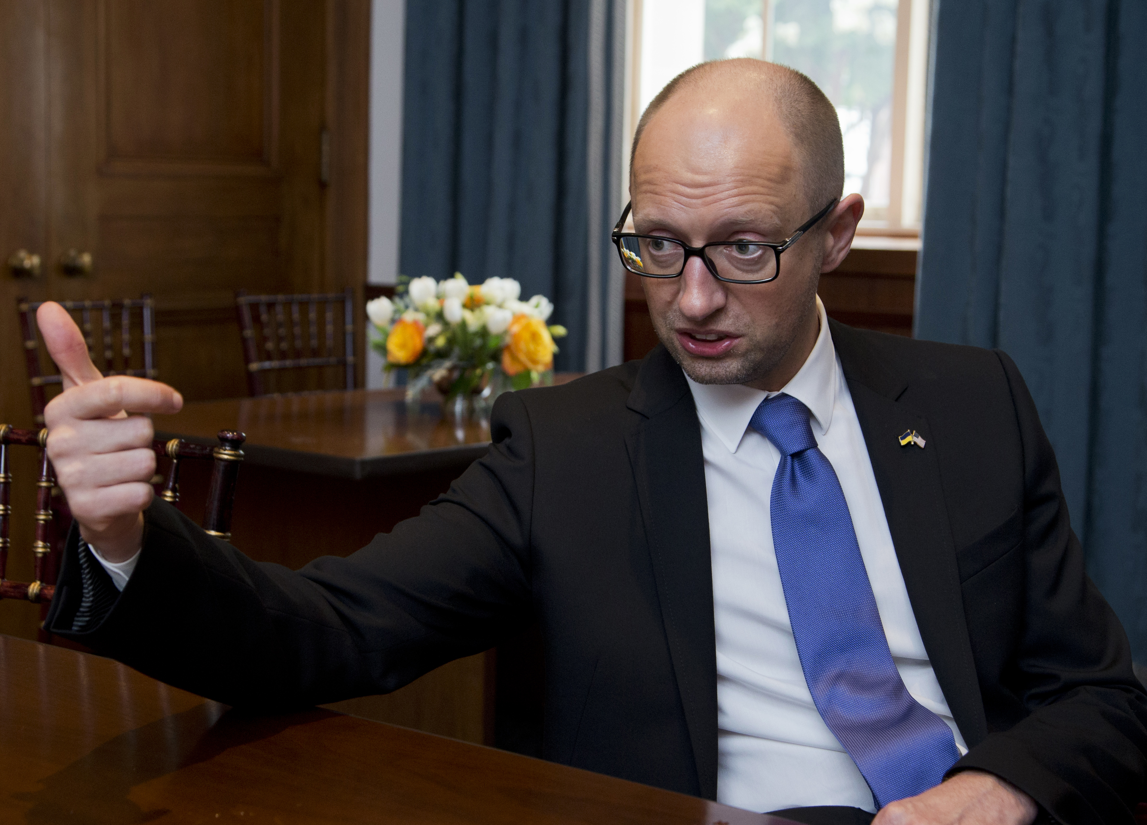 Ukrainian Prime Minister Arseniy Yatsenyuk speaks during an interview with the Associated Press following the first U.S.-Ukraine Business Forum co-hosted by the U.S. Chamber of Commerce and the Commerce Department, Monday, July 13, 2015, in Washington.   (AP Photo/Manuel Balce Ceneta) (AP)