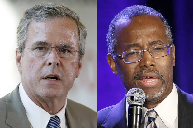 (AP/Charlie Neibergall/Reuters/Earnie Grafton)