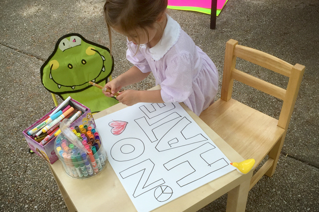 A photo of the author's daughter, making signs. (Ben Carlisle)