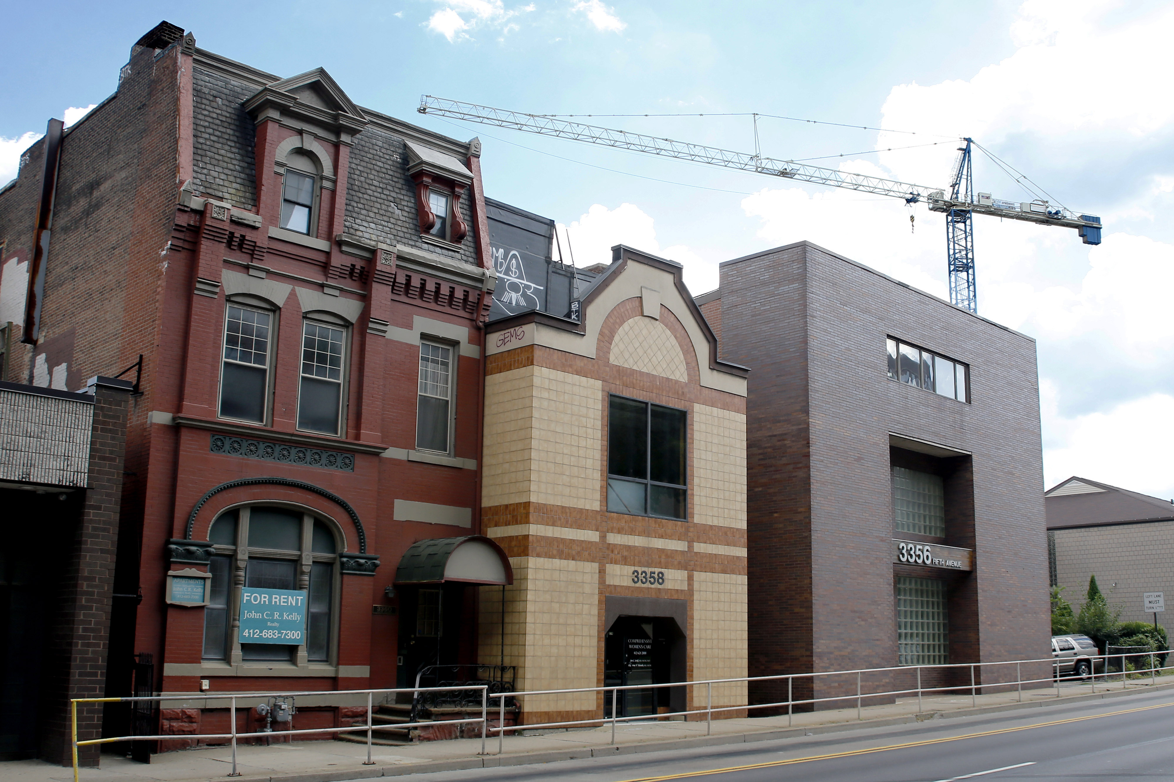 The office of Dr. Jan Casimir Seski, center, is seen Sunday, Aug. 2, 2015, in Pittsburgh. The Zimbabwe National Parks and Wildlife Management Authority accused Seski, whom they said is an American, of being involved in an illegal bow and arrow lion hunt in April.(AP Photo/Keith Srakocic) (AP)