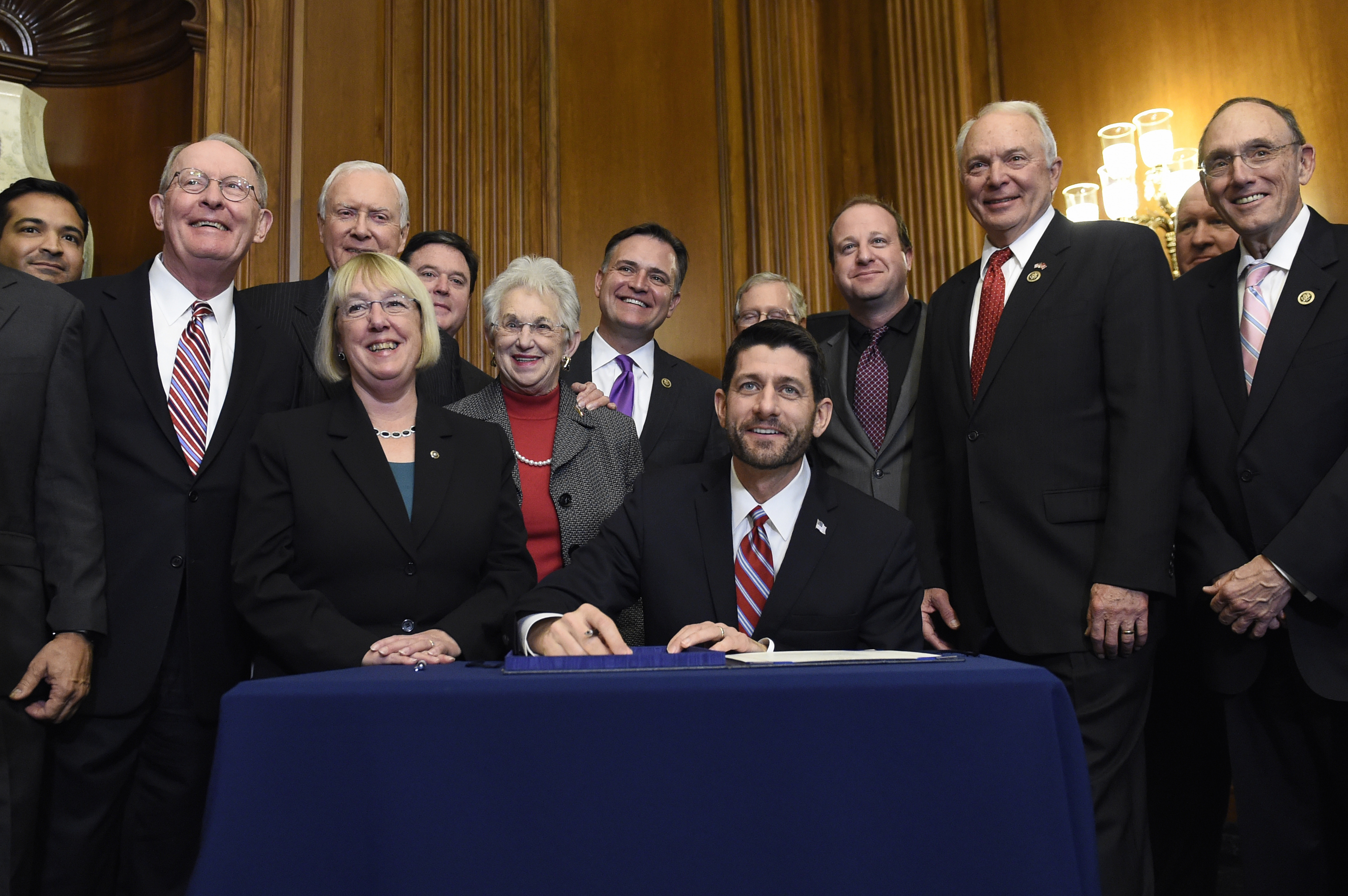 House Speaker Paul Ryan of Wis. prepares to sign legislation on Capitol Hill in Washington, Wednesday, Dec. 9, 2015, that changes how the nation's public schools are evaluated, rewriting the landmark No Child Left Behind education law of 2002. (AP Photo/Susan Walsh) (AP)