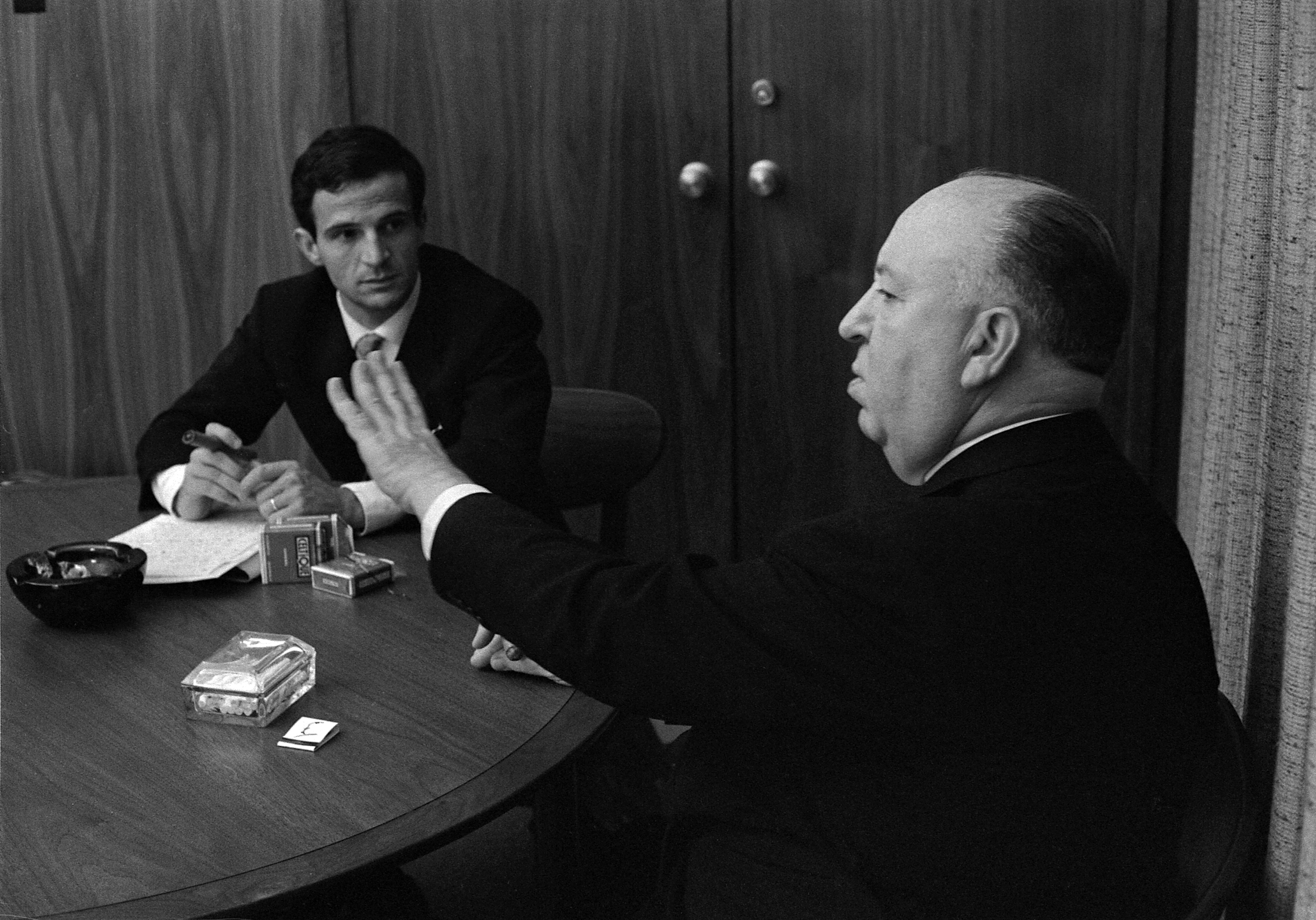 This 1962 image released by Cohen Media Group shows Francois Truffaut, left, and director Alfred Hitchcock in a scene from Kent Joness documentary, "Hitchcock/Truffaut." The new documentary by critic, filmmaker and New York Film Festival head Kent Jones, is about that extraordinary meeting and its long reverberations through cinema. (Philippe Halsman/Cohen Media Group via AP) (AP)