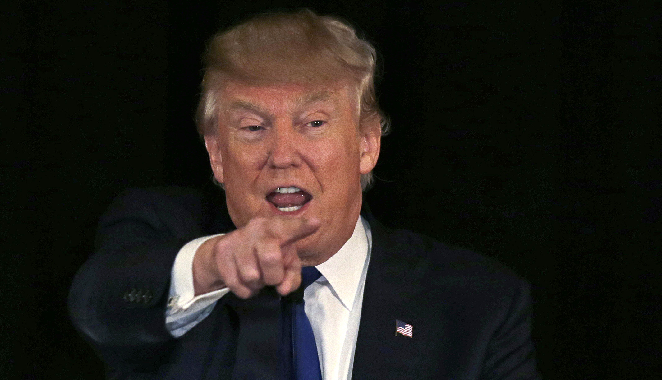 In this Dec. 10, 2015, photo, Republican presidential candidate, businessman Donald Trump gestures during an address at a regional police union meeting in Portsmouth, N.H. (AP Photo/Charles Krupa) (AP)