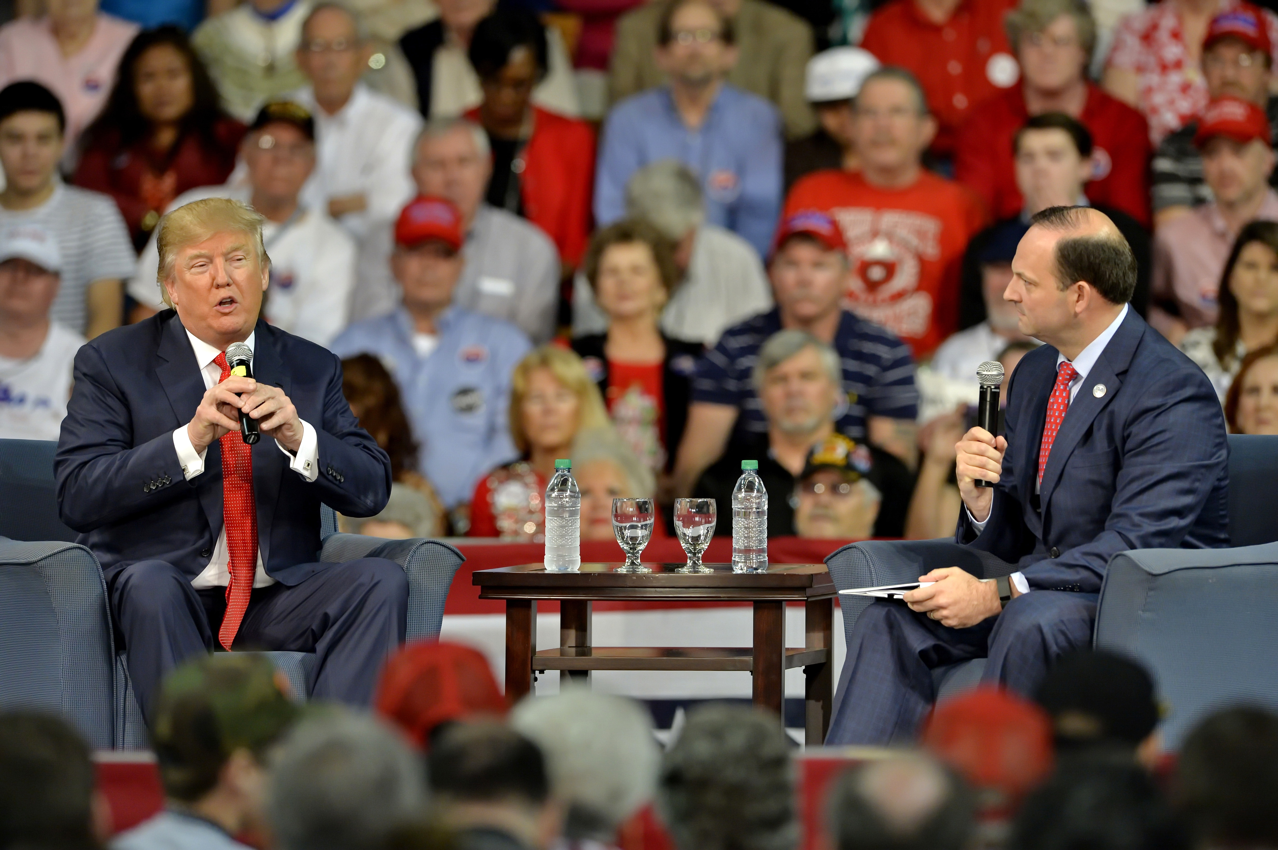 Republican presidential candidate Donald Trump answers questions from South Carolina Attorney General Alan Wilson, right, at a town hall meeting in the Convocation Center on the University of South Carolina Aiken campus Saturday, Dec. 12, 2015, in Aiken, S.C. (AP Photo/Richard Shiro) (AP)