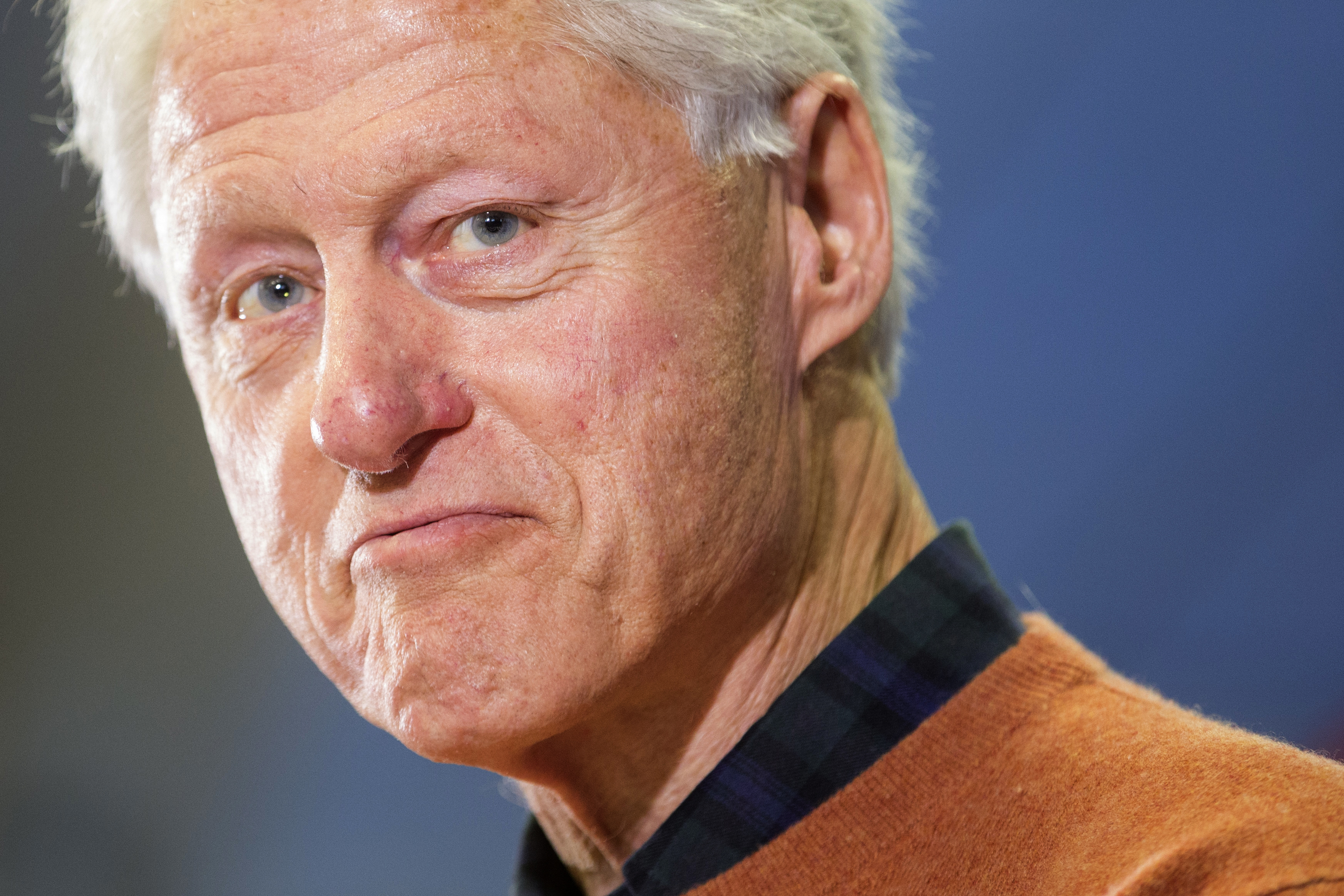 In this Jan. 20, 2016, photo, former President Bill Clinton smiles as he speaks at a campaign stop for his wife, Democratic presidential candidate Hillary Clinton at the Green Street Community Center in Concord, N.H. In the 2016 presidential campaign, a modern take on gender roles is increasingly on display in both parties. Hillary Clinton is looking to get back into the White House, but this time as president.  (AP Photo/John Minchillo) (AP)