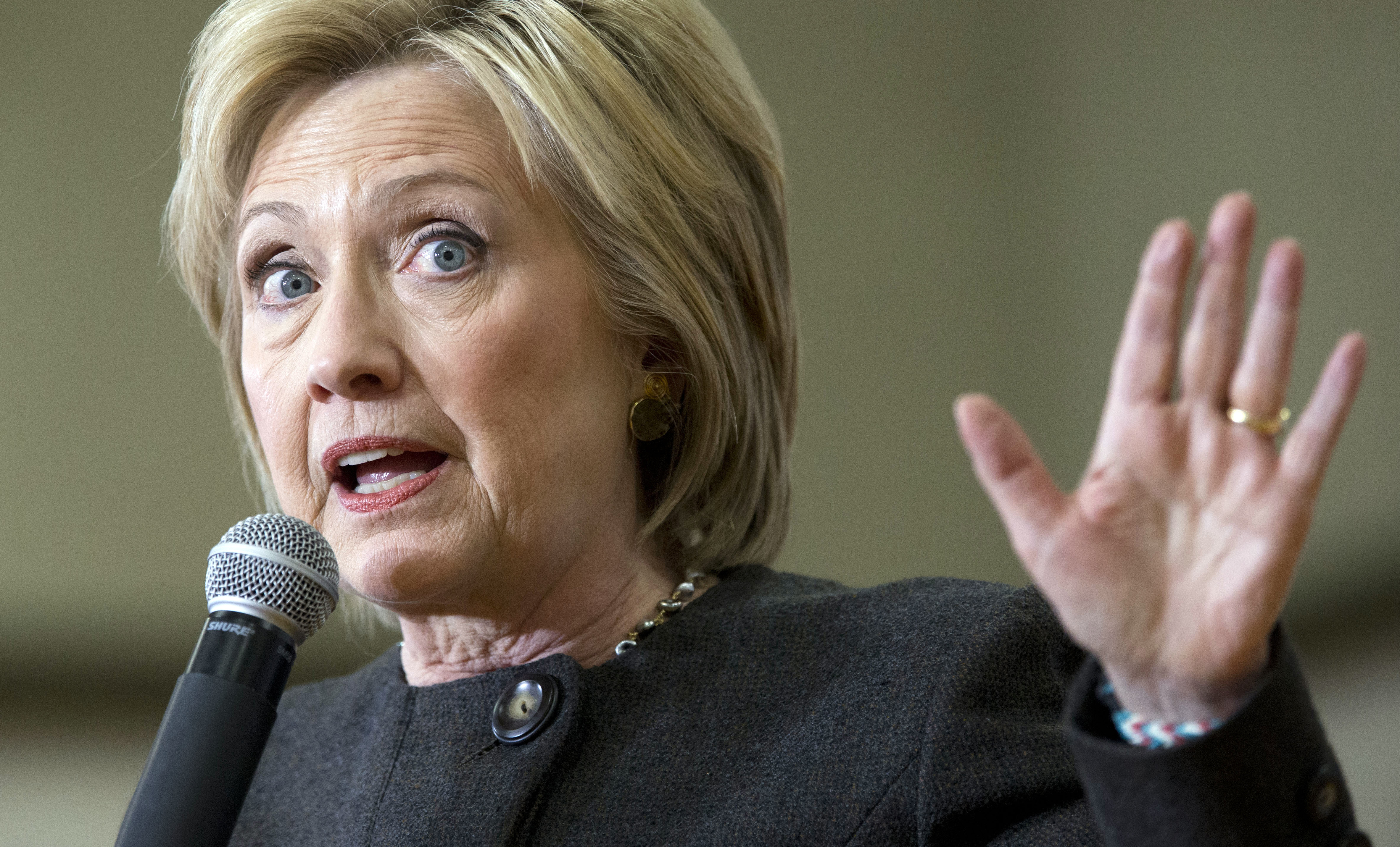 In this Jan. 25, 2016, photo, Democratic presidential candidate Hillary Clinton speaks during a campaign event at the Knoxville School District Administration Office in Knoxville, Iowa. Battling across Iowa ahead of the first-in-the-country vote on Feb. 1, Clinton and Bernie Sanders are dueling on fertile populist ground: resentment against Wall Street, bailed-out big banks and a financial system seen as rigged. (AP Photo/Mary Altaffer) (AP)