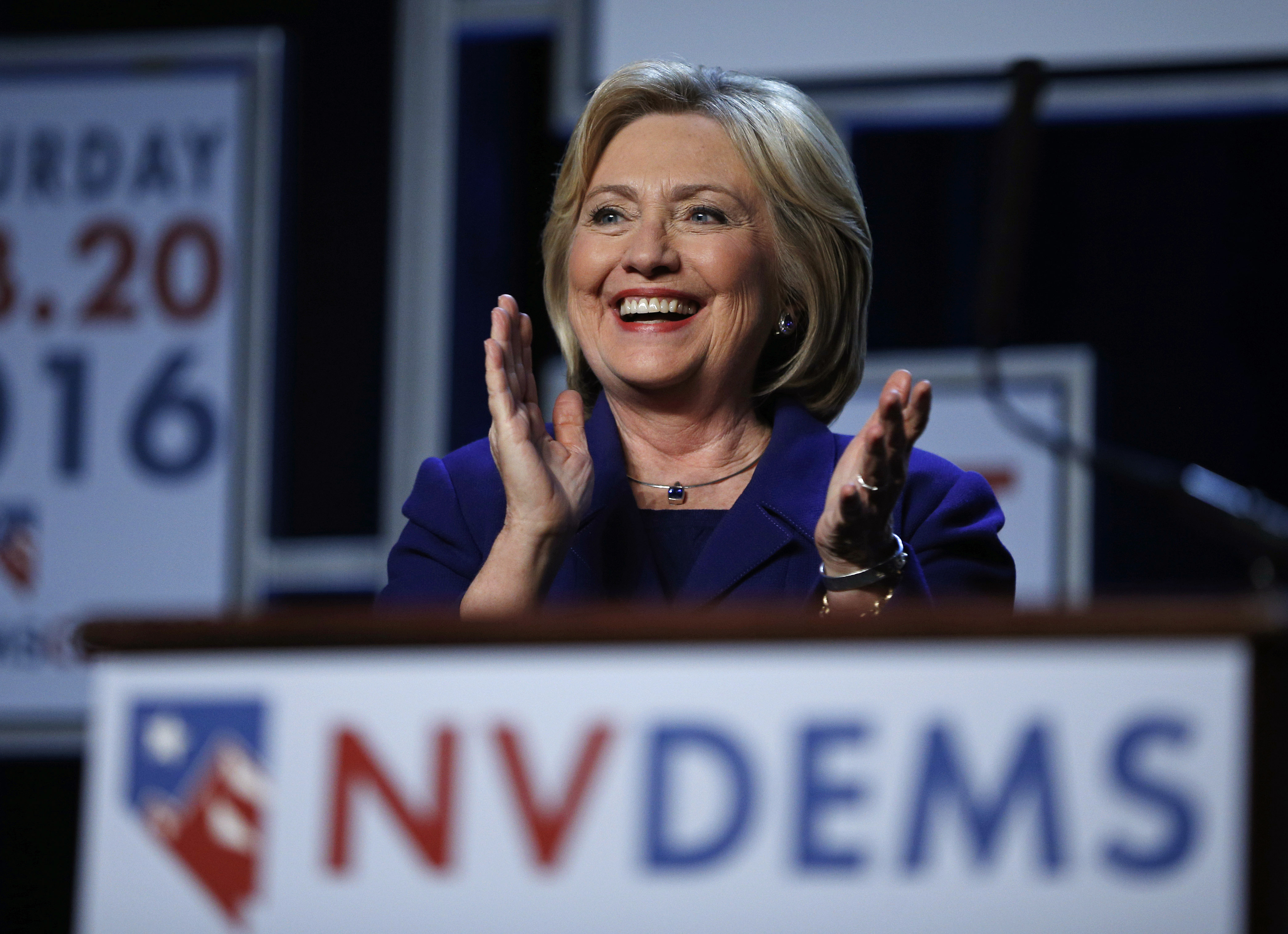 Democratic presidential candidate Hillary Clinton stands on stage at the Battle Born Battleground First in the West Caucus Dinner, Wednesday, Jan. 6, 2016, in Las Vegas. (AP/John Locher)