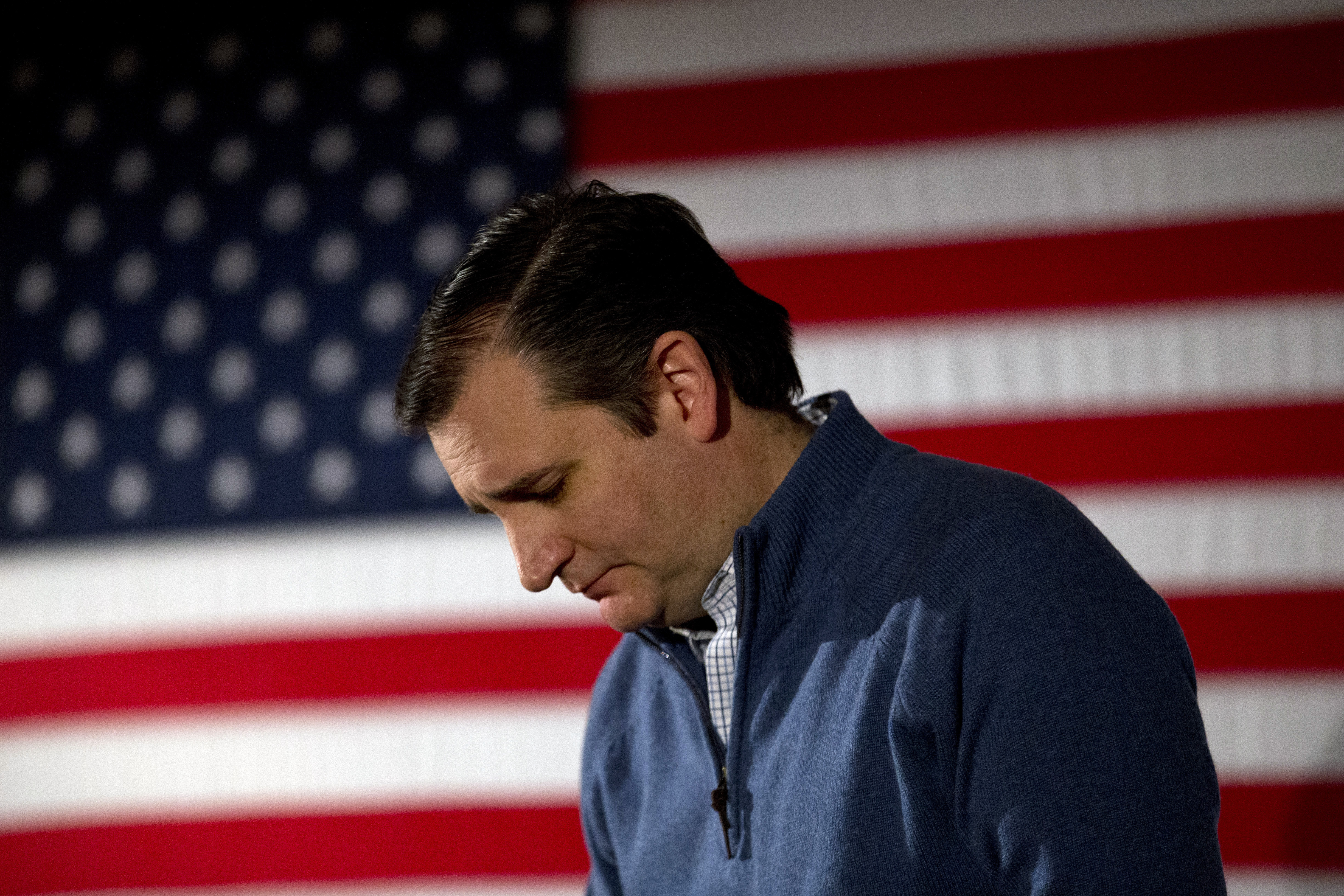 Republican presidential candidate, Sen. Ted Cruz, R-Texas, looks downward while listening to a question from the crowd at a campaign event (AP)