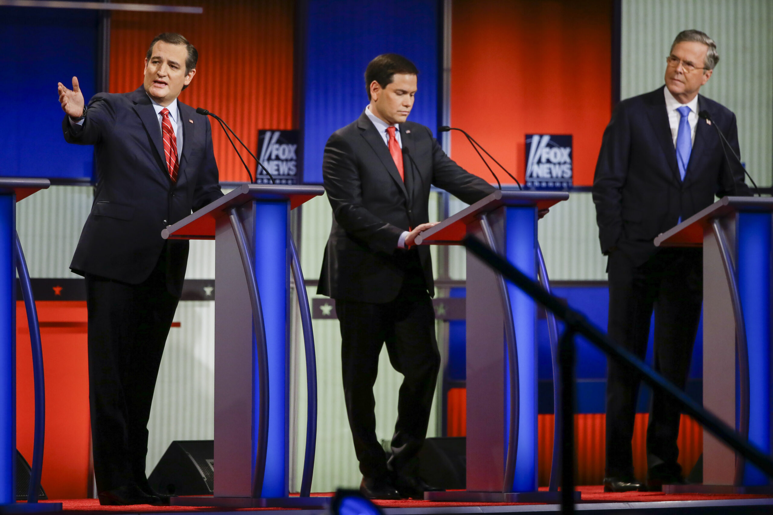 Republican presidential candidate Sen. Ted Cruz, R-Texas, left, answers a question as Sen. Marco Rubio, R-Fla., center, listens and former Florida Gov. Jeb Bush, right, looks on during a Republican presidential primary debate, Thursday, Jan. 28, 2016, in Des Moines, Iowa. (AP Photo/Charlie Neibergall) (AP)