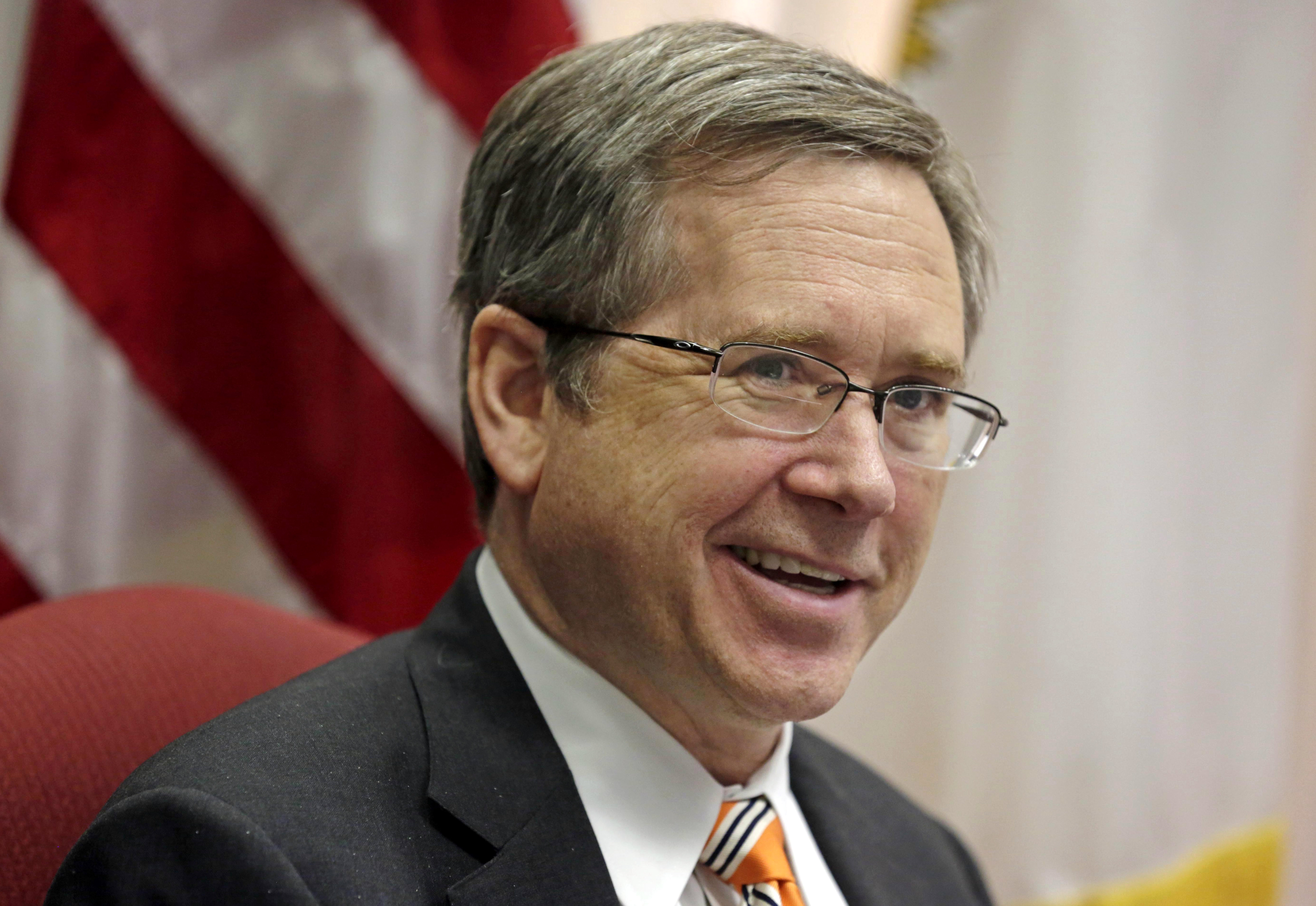 FILE - In this June 9, 2014 file photo, U.S. Sen. Mark Kirk R-Ill., speaks in his office in Chicago. Kirk is making national security a prime focus of his bid for a second term. Its a strategy that has historically worked well for the GOP, particularly at times when voters are on edge about the countrys safety, as many are now. He faces Democratic U.S. Rep. Tammy Duckworth in the November election. (AP Photo/M. Spencer Green, File) (AP)