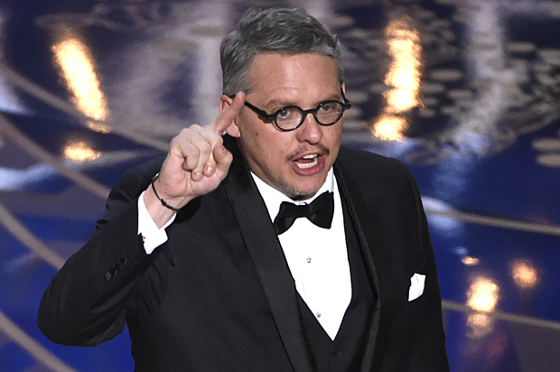 Adam McKay accepts the award for best adapted screenplay for “The Big Short” at the Oscars, Feb. 28, 2016, at the Dolby Theatre in Los Angeles. (AP/Chris Pizzello)
