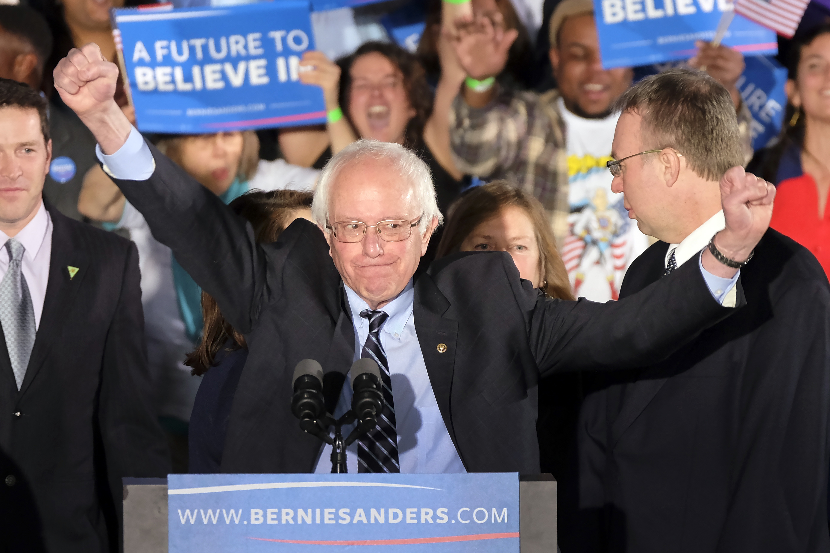 Democratic presidential candidate, Sen. Bernie Sanders, I-Vt., reacts to the cheering crowd at his primary night rally Tuesday, Feb. 9, 2016, in Manchester, N.H. (AP Photo/J. David Ake) (AP)