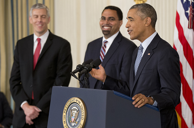 Arne Duncan, John King, Barack Obama (AP/Manuel Balce Ceneta)