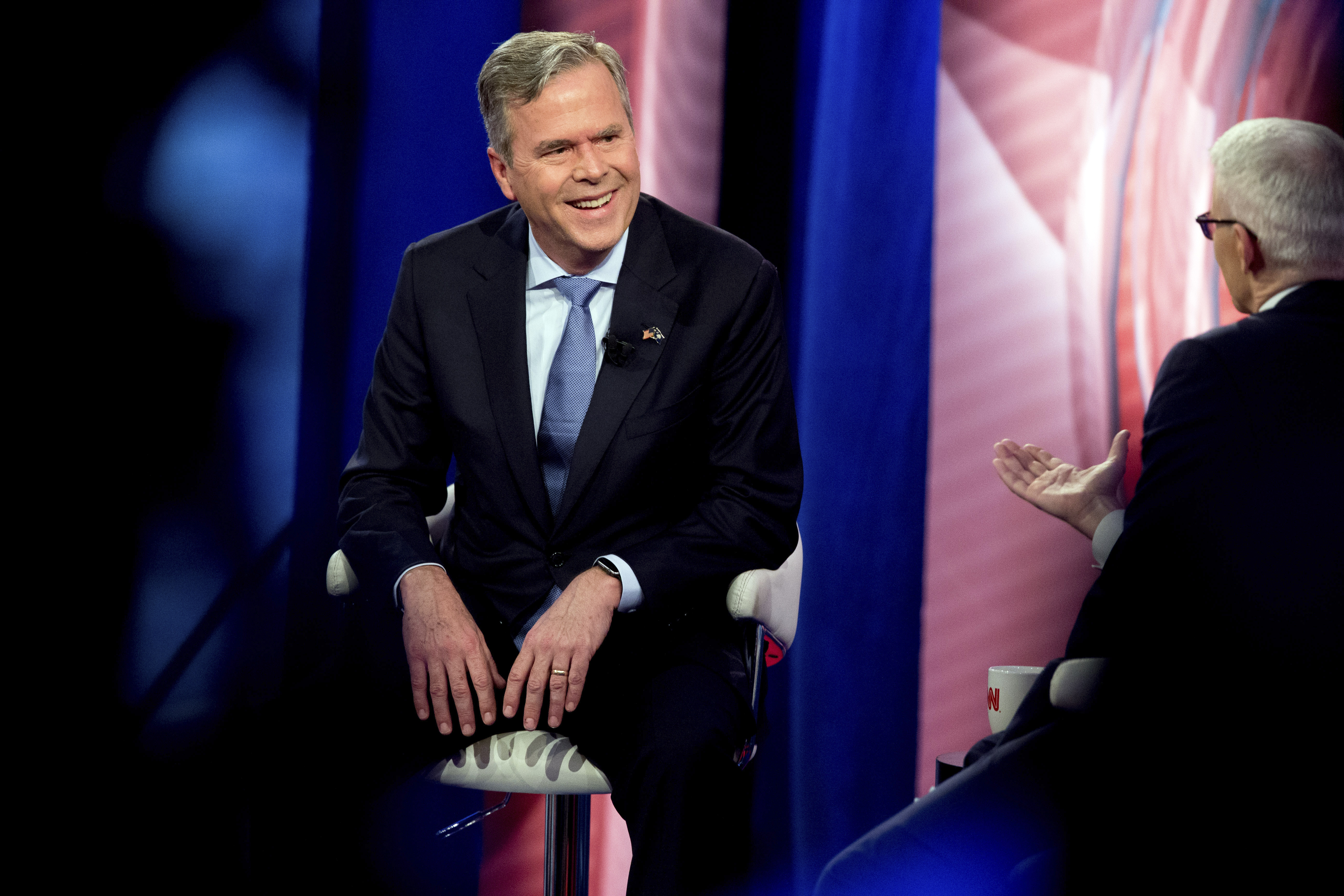 Republican presidential candidate, former Florida Gov. Jeb Bush speaks with Anderson Cooper at a CNN town hall at the University of South Carolina in Columbia, S.C., Thursday, Feb. 18, 2016. (AP Photo/Andrew Harnik) (AP)