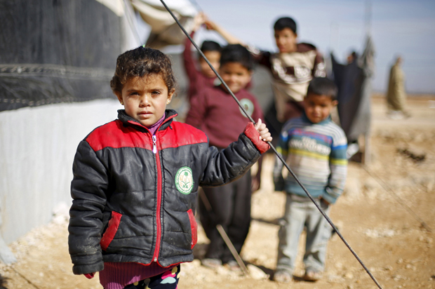 Syrian refugee children at Al Zaatari refugee camp in the Jordanian city of Mafraq, near the border with Syria, January 30, 2016. (Reuters/Muhammad Hamed)