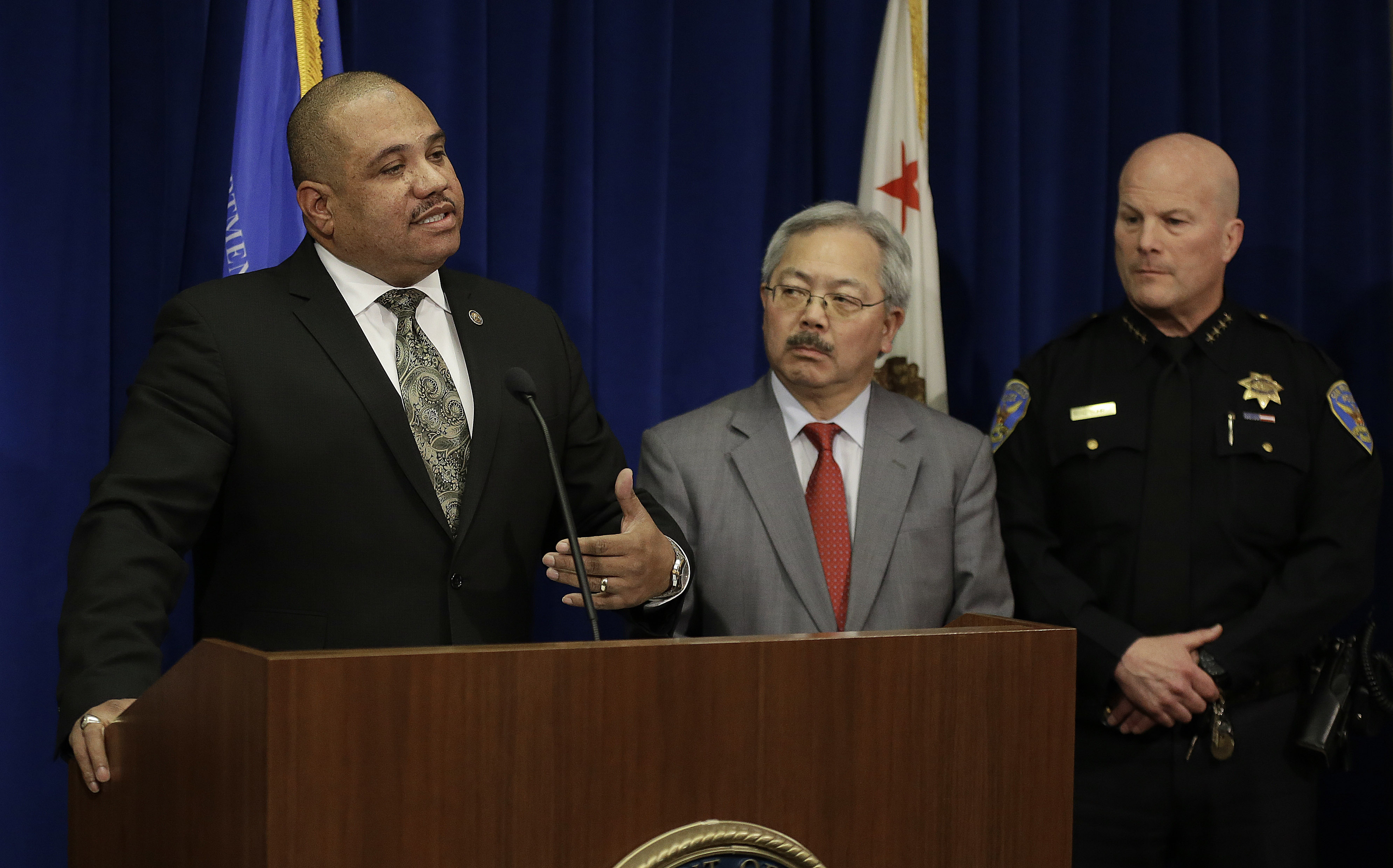 U.S. Department of Justice Office of Community Oriented Policing Services Director Ronald Davis, San Francisco Mayor Ed Lee, and San Francisco Chief of Police Greg Suhr (AP/Ben Margot)