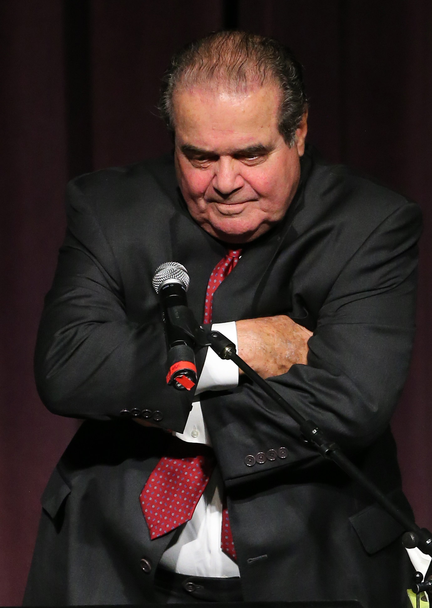 FILE - In this Oct. 1, 2014, file photo, U.S. Supreme Court Justice Antonin Scalia speaks to an audience gathered at the University of Colorado, in Boulder, Colo. Scalia, 79, was found dead the morning of Saturday, Feb. 13, 2016, at a private residence in the Big Bend area of West Texas. Scalia's body lay in a Texas funeral home Sunday and officials awaited word about whether they would need to perform an autopsy before the late Supreme Court justice could return home to Virginia. (AP Photo/Brennan Linsley, File) (AP)