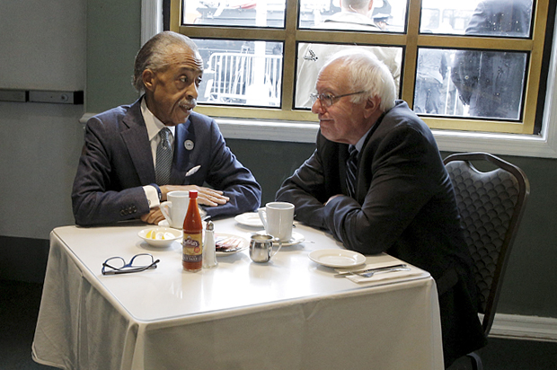 Bernie Sanders (R) meets with the Rev. Al Sharpton at Sylvia's Restaurant in Harlem, February 10, 2016. (Reuters/Brendan McDermid)