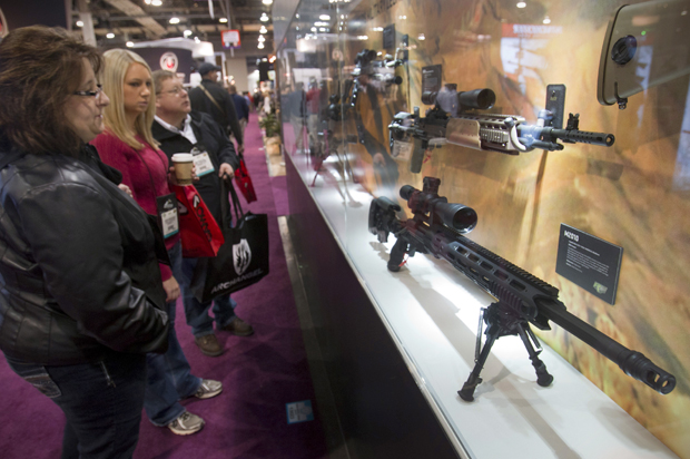 Attendees at the annual SHOT Show in Las Vegas, January 15, 2013. (Reuters/Steve Marcus)