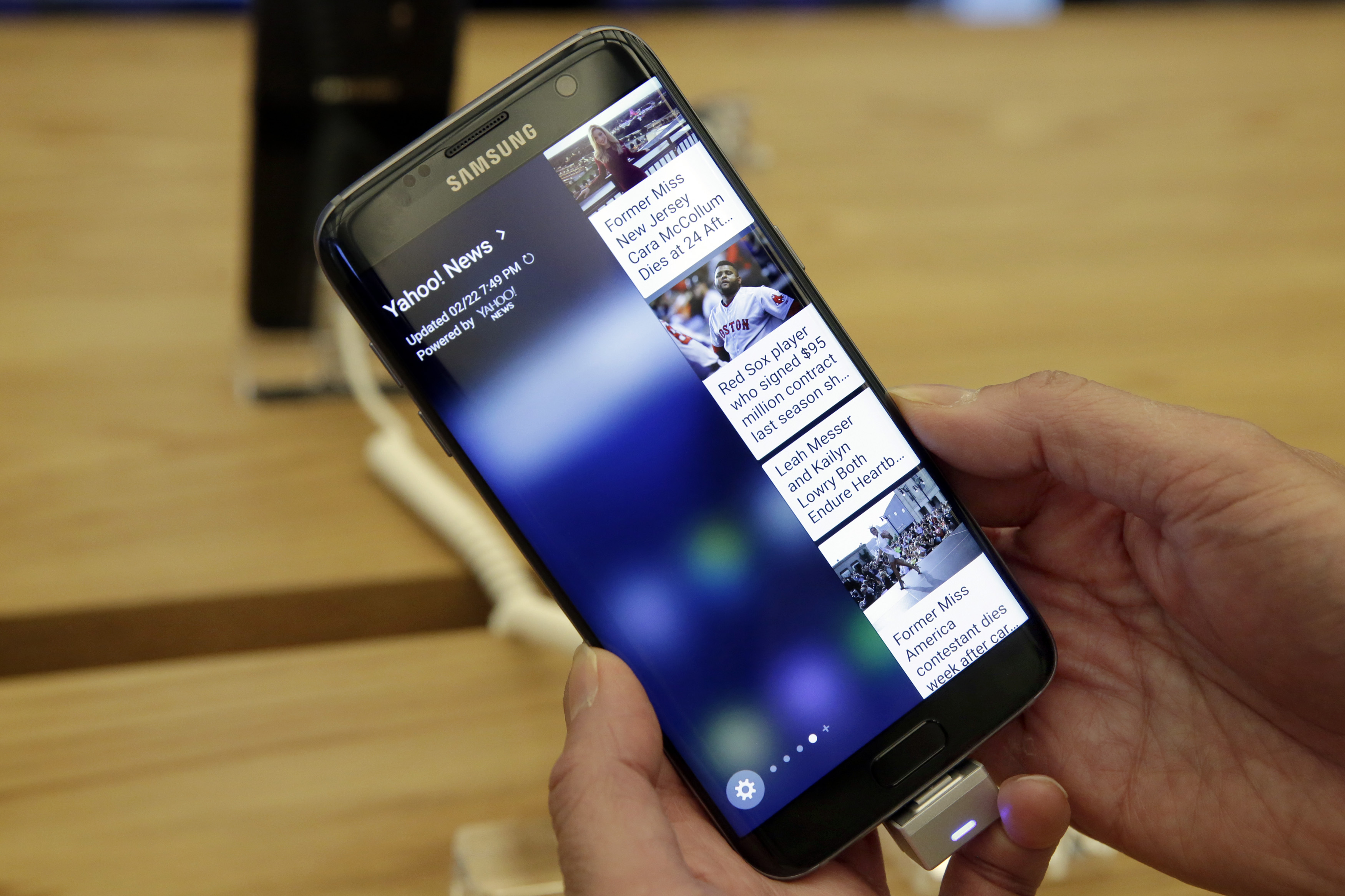 A Samsung Galaxy S7 Edge mobile phone is displayed during a preview of Samsung's flagship store, Samsung 837, in New York's Meatpacking District, Monday, Feb 22, 2016. Samsung is opening what it calls a "technology playground" in New York for customers to check out its latest gadgets. The center opens Tuesday, the day Samsung starts taking orders for its upcoming Galaxy S7 and S7 Edge phones. (AP Photo/Richard Drew) (AP)
