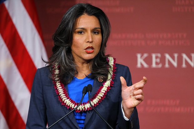 Congresswoman Tulsi Gabbard (D-HI) speaks at an award ceremony at the Kennedy School of Government at Harvard University on November 25, 2013 (Reuters/Brian Snyder)