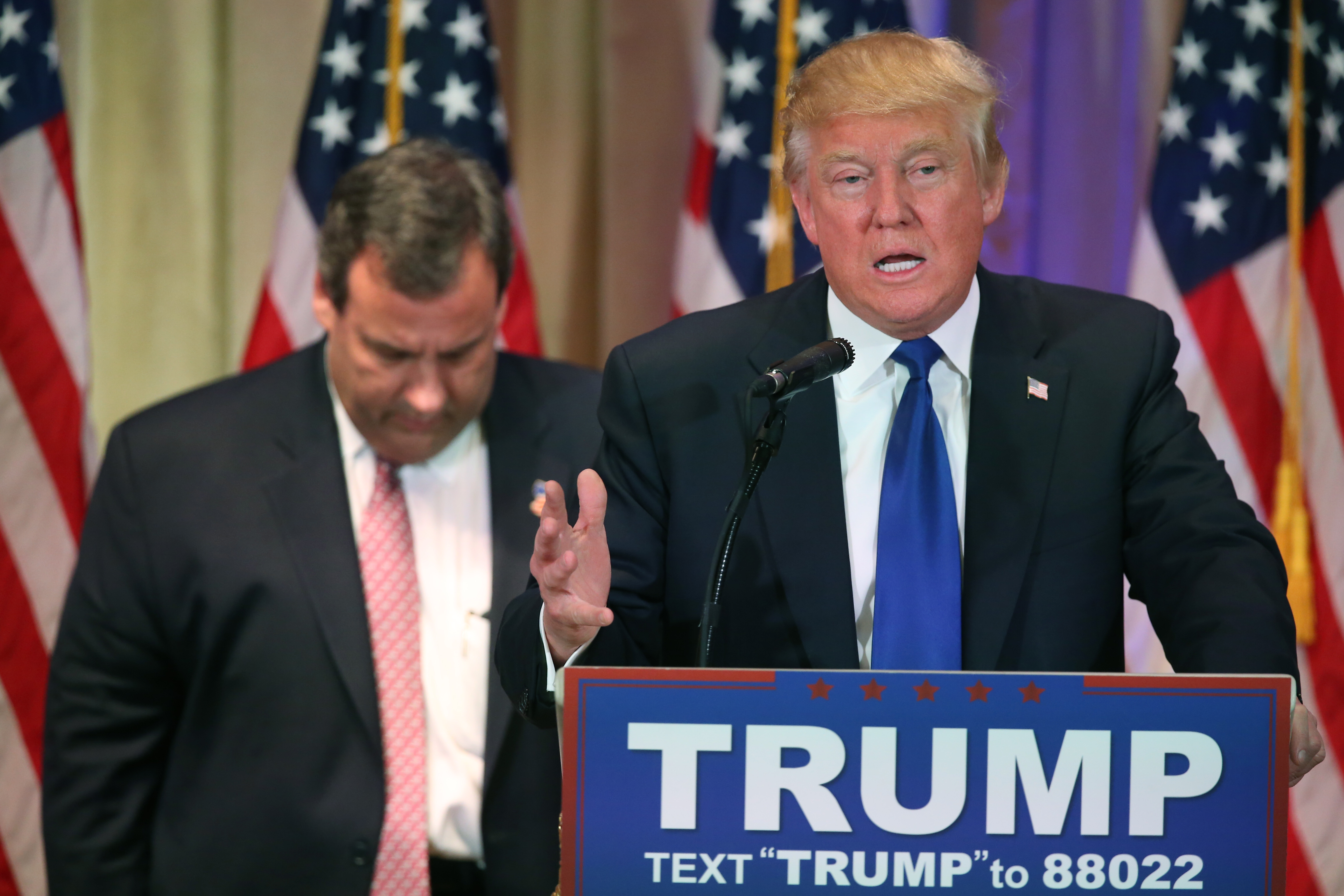 Republican presidential candidate Donald Trump speaks on Super Tuesday primary election night at the White and Gold Ballroom at The Mar-A-Lago Club in Palm Beach, Fla., Tuesday, March 1, 2016, as New Jersey Gov. Chris Christie listens. (AP Photo/Andrew Harnik) (AP)