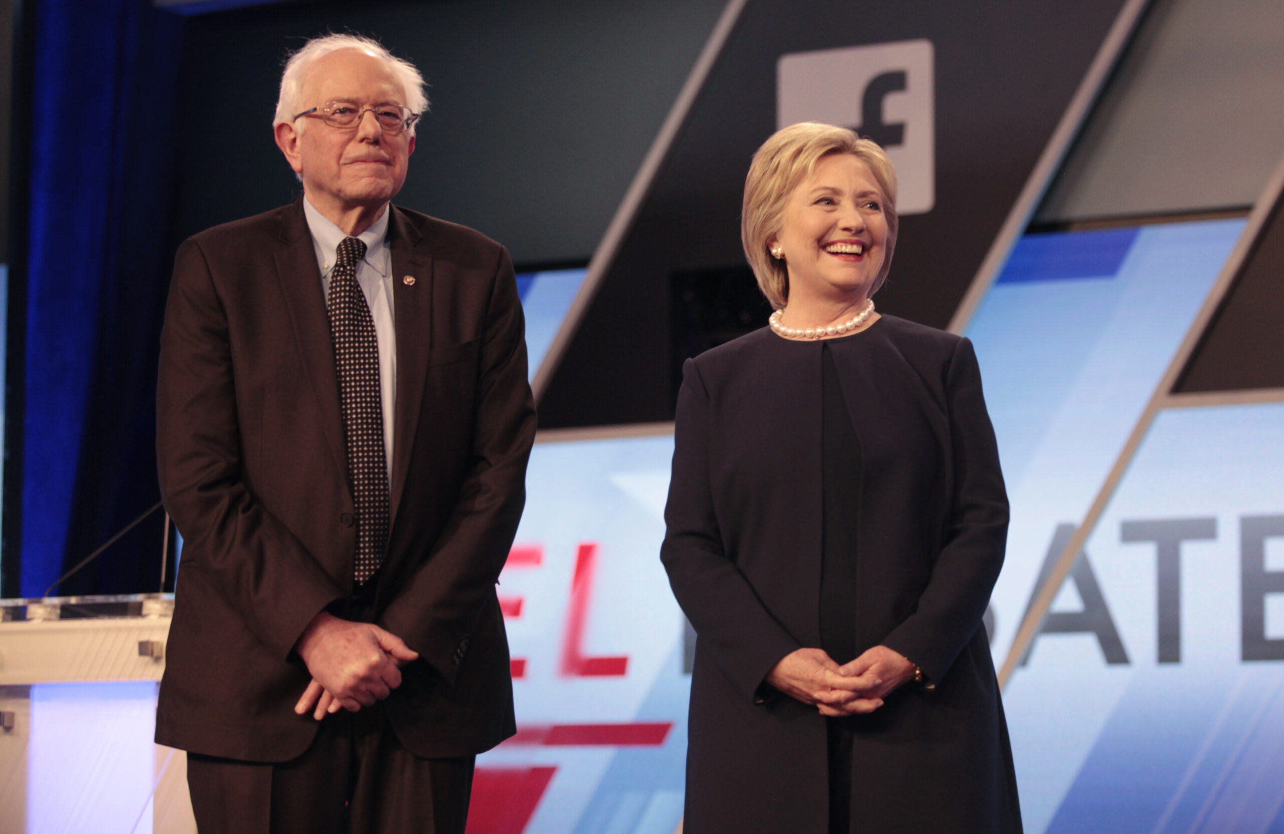 Democratic U.S. presidential candidates Senator Bernie Sanders and Hillary Clinton pose before the start of the Univision News and Washington Post Democratic U.S. presidential candidates debate in Kendall, Florida March 9, 2016.  REUTERS/Javier Galeano  - RTSA3V8 (Reuters)