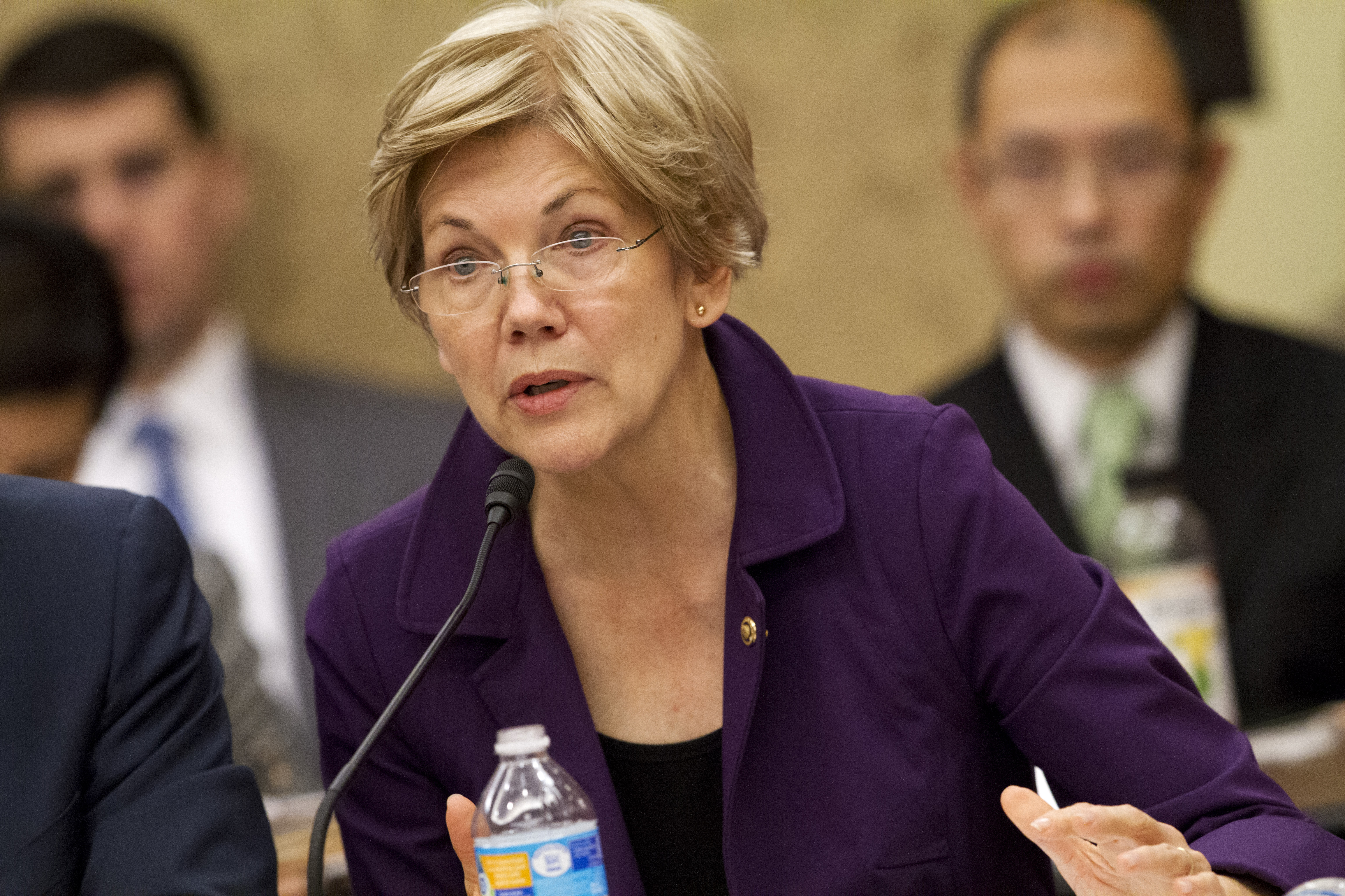 In this photo taken Nov. 18, 2015, Sen. Elizabeth Warren, D-Mass. speaks on Capitol Hill in Washington. Warren labeled Donald Trump a loser, a bully and a threat on Monday, March 21, 2016, continuing a fierce war of words between the liberal icon and the front-running Republican presidential candidate that has played out on social media and The New York Times. () (AP Photo/Jacquelyn Martin)