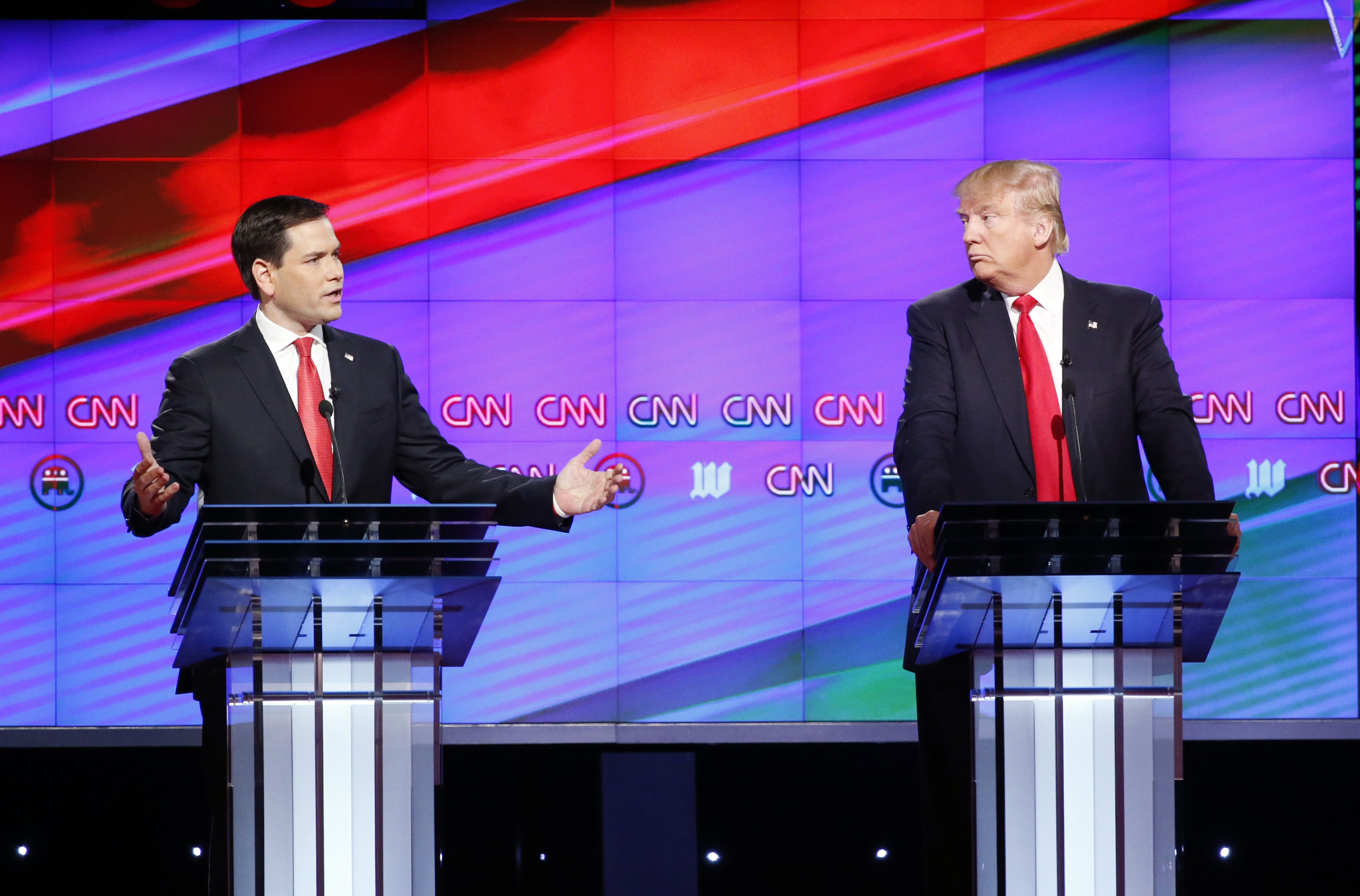 Republican presidential candidate, Sen. Marco Rubio, R-Fla., left,  answers a question, as Republican presidential candidate, businessman Donald Trump listens, during the Republican presidential debate sponsored by CNN, Salem Media Group and the Washington Times at the University of Miami,  Thursday, March 10, 2016, in Coral Gables, Fla. (AP Photo/Wilfredo Lee) (AP)