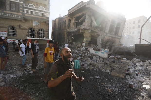A Yemeni man cries out after a Saudi-led bombing in Yemen's capital Sanaa, on February 10, 2016 (Reuters/Khaled Abdullah)