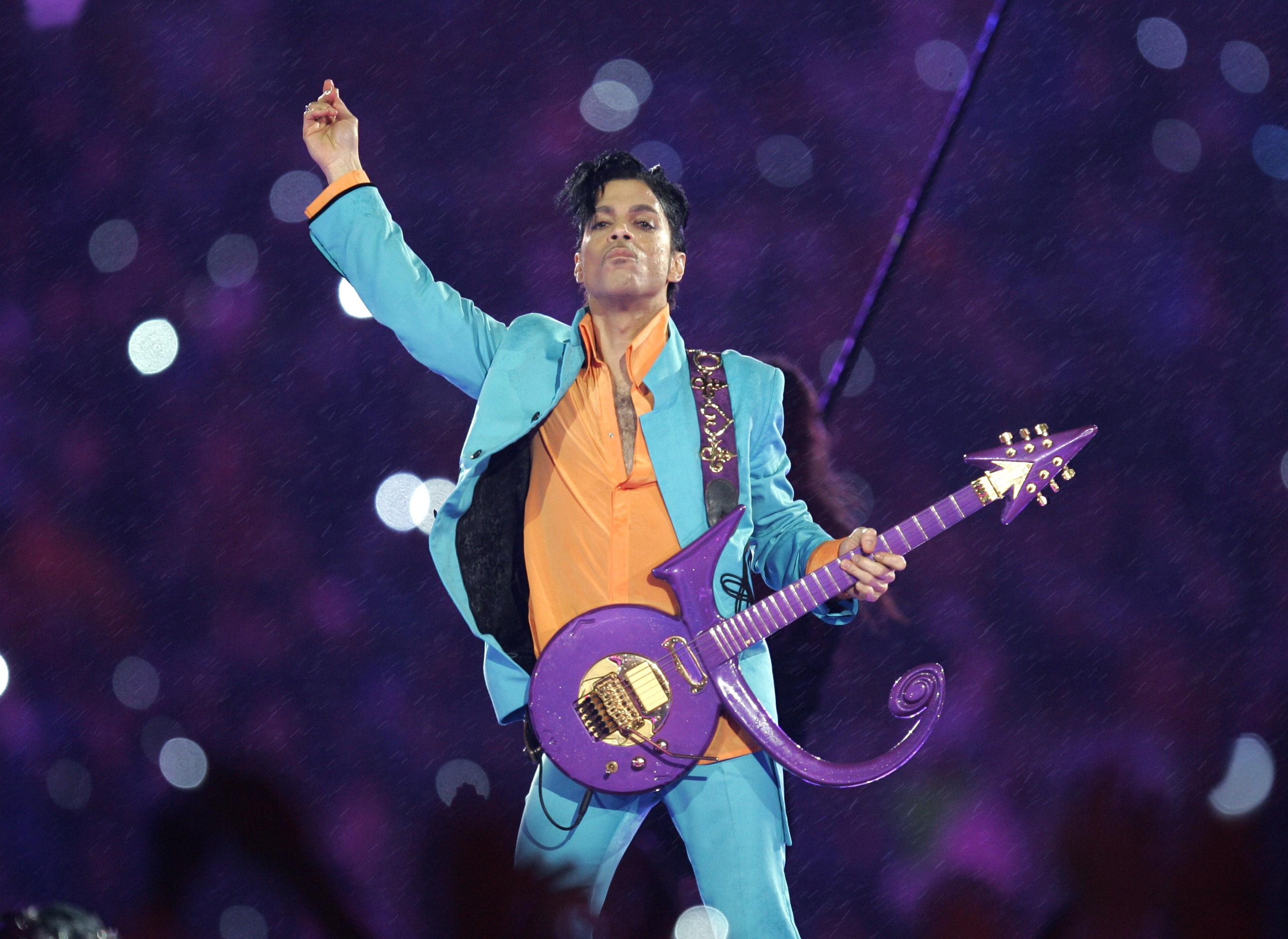 FILE - In this Feb. 4, 2007 file photo, Prince performs during the halftime show at the Super Bowl XLI football game at Dolphin Stadium in Miami. Prince, widely acclaimed as one of the most inventive and influential musicians of his era with hits including "Little Red Corvette," ''Let's Go Crazy" and "When Doves Cry," was found dead at his home on Thursday, April 21, 2016, in suburban Minneapolis, according to his publicist. He was 57. (AP Photo/Chris O'Meara, File) (AP)
