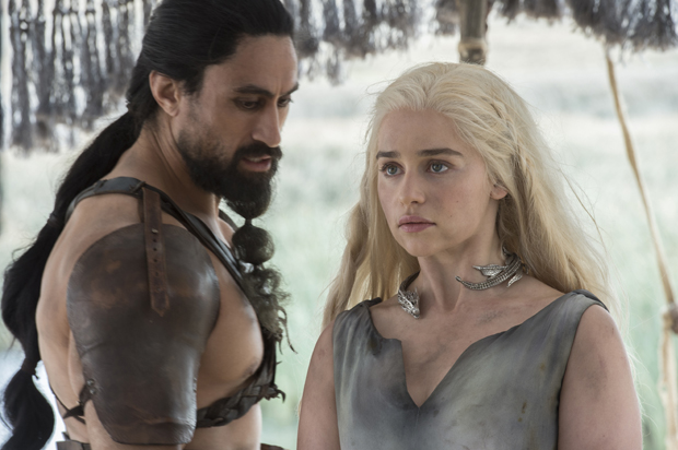 Joe Naufahu and Emilia Clarke in "Game of Thrones" (HBO)
