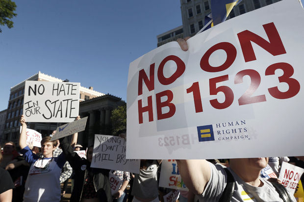 Protesters outside the Governor's Mansion in Jackson, Miss., April 4, 2016. (AP/Rogelio V. Solis)
