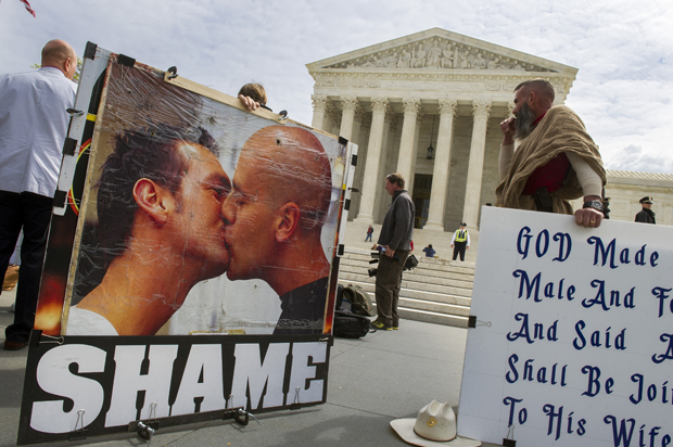 Anti-gay marriage protestors demonstrate in front of the Supreme Court, April 27, 2015. (AP/Cliff Owen)