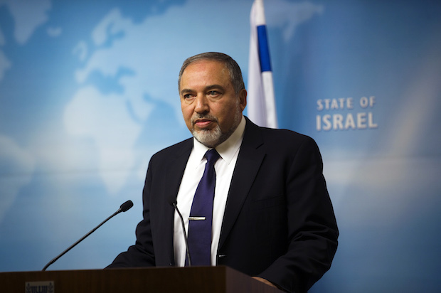 Israel's then-Foreign Minister Avigdor Lieberman in his Jerusalem office on December 2, 2014 (Reuters/Ronen Zvulun)