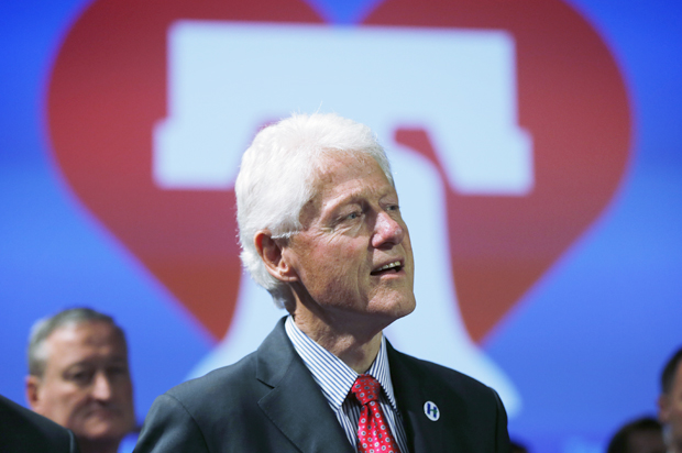 Bill Clinton listens to Democratic presidential candidate Hillary Clinton speak at her presidential primary election night rally, April 26, 2016, in Philadelphia. (AP/Matt Rourke)