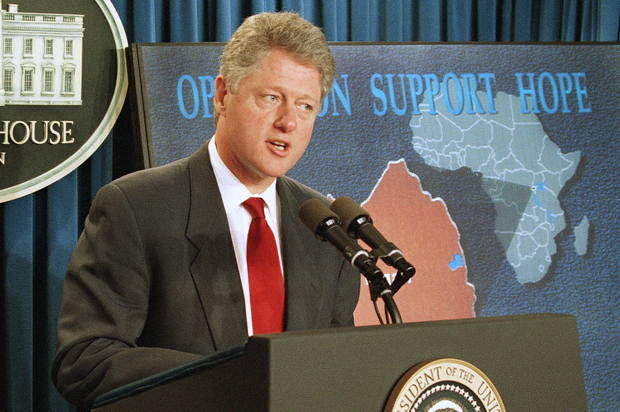 Bill Clinton announces that he has asked Congress to approve emergency funds of $320 million to supply water and food to refugees who have fled Rwanda, July 29, 1994. (AP/Wilfredo Lee)