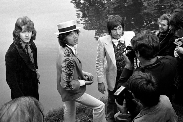 Mick Taylor, Mick Jagger, and Charlie Watts pose during a press conference in Paris, France in 1970. (AP)