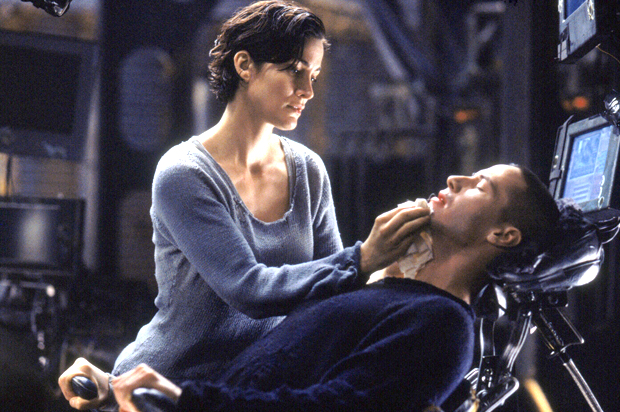 Carrie-Anne Moss and Keanu Reeves in "The Matrix" (Warner Bros.)