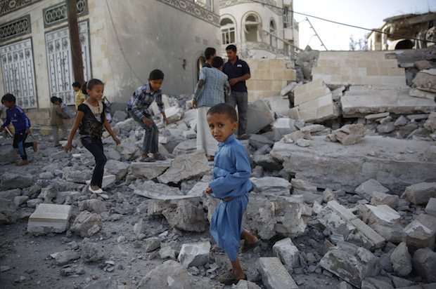 Yemeni children play in the rubble of a house destroyed by a Saudi-led airstrike in Sanaa, Yemen on Sept. 8, 2015 (AP/Hani Mohammed)