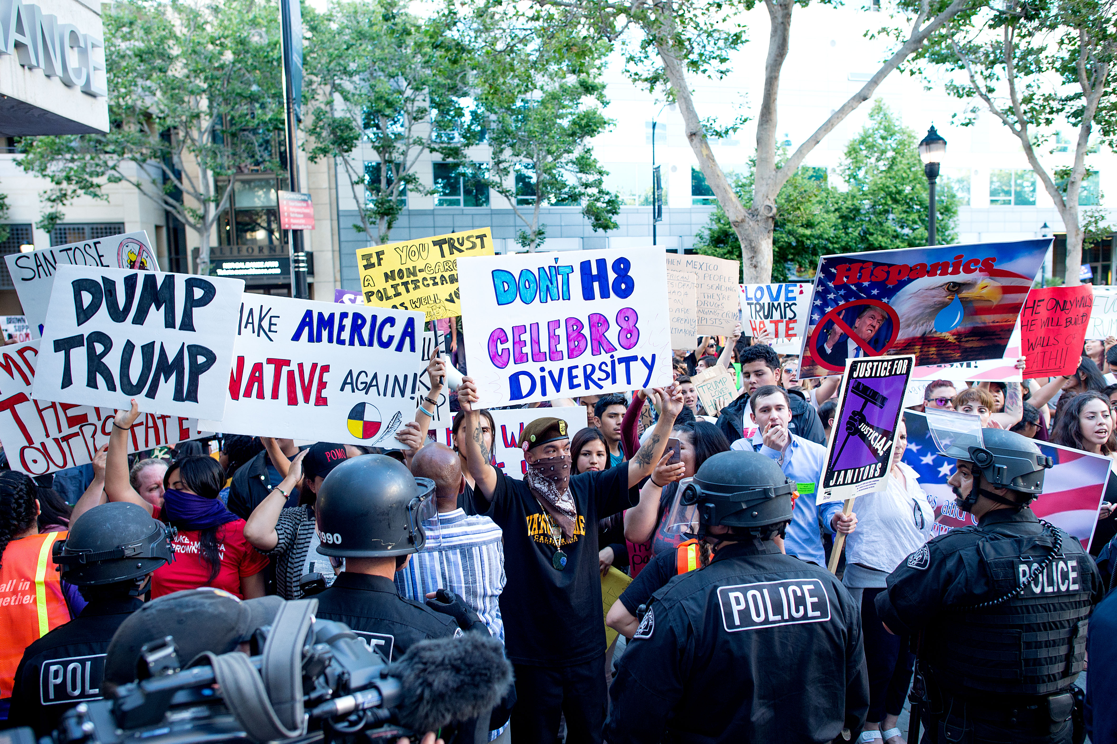 Police form a line to contain protesters outside a campaign rally for Republican presidential candidate Donald Trump on Thursday, June 2, 2016, in San Jose, Calif.  (AP Photo/Noah Berger) (AP)