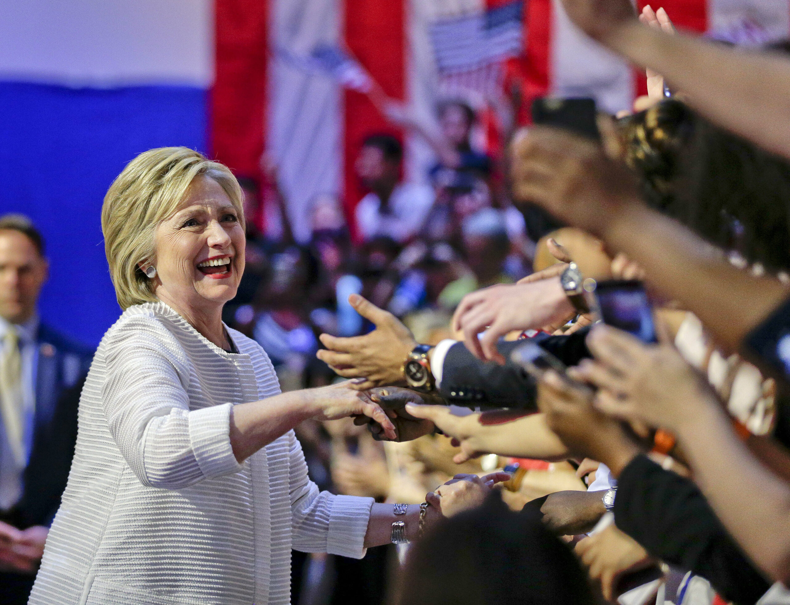 Democratic presidential candidate Hillary Clinton greets supporters as she arrives to speak during a presidential primary election night rally, Tuesday, June 7, 2016, in New York. (AP Photo/Julie Jacobson) (AP)