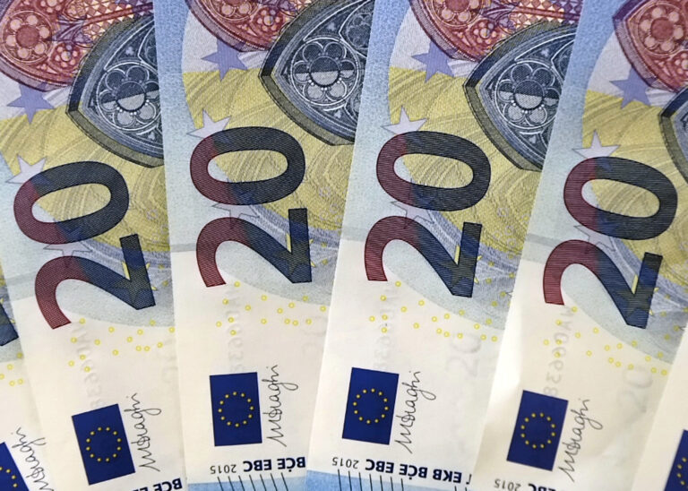 FILE - In this Tuesday, Oct. 27, 2015, file photo, new 20 euro banknotes are arranged for display during a news conference at the branch office of the German Federal Bank in Erfurt, Germany. (AP Photo/Jens Meyer, File) (AP)