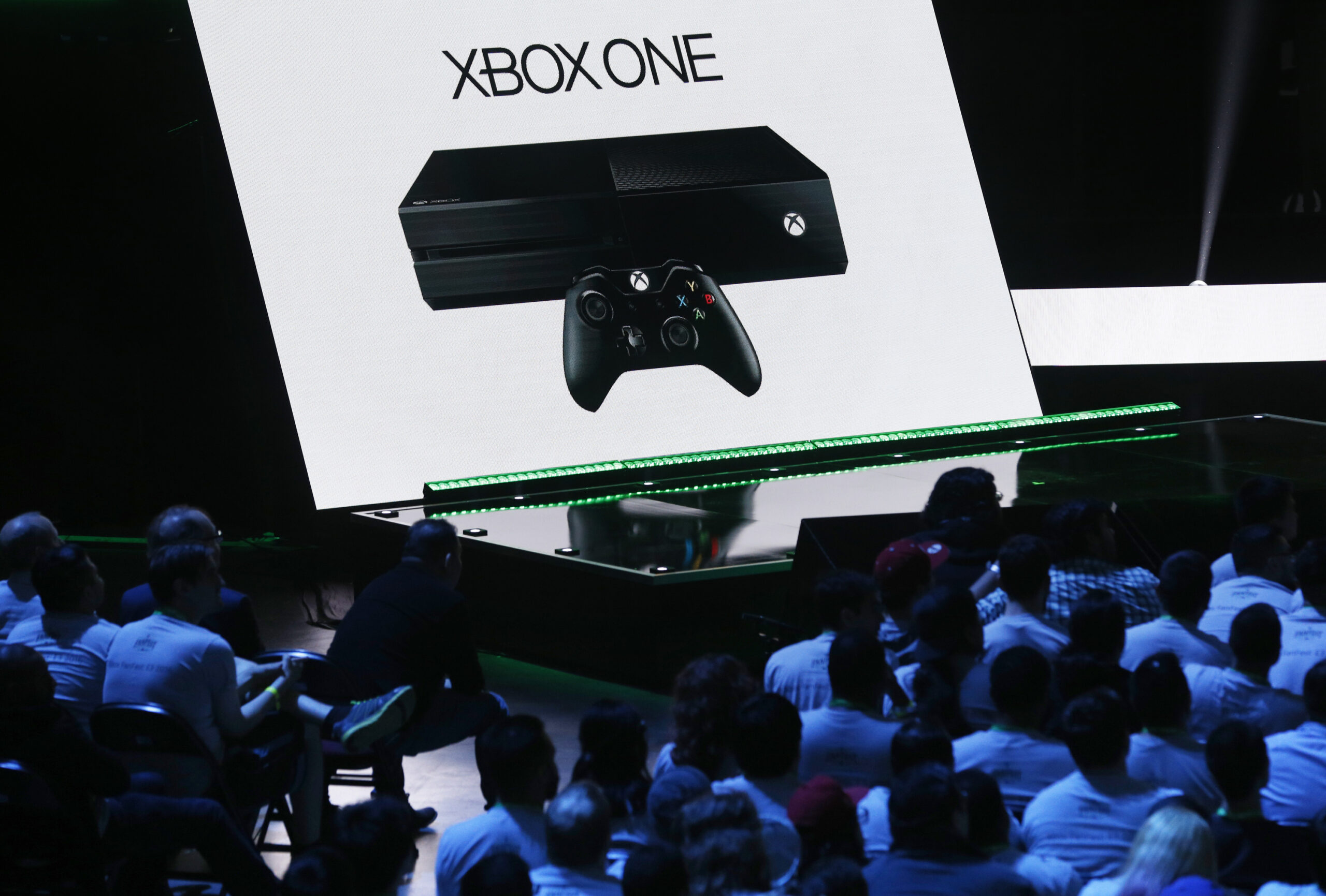 Members of the media attend a briefing at the Electronic Entertainment Expo in Los Angeles on Monday, June 13, 2016. Microsoft unveiled a new, slimmer version of the video game console coming later this year and a more powerful one that's due in 2017. Xbox One is shrinking in size and growing in power. (AP Photo/Nick Ut) (AP)