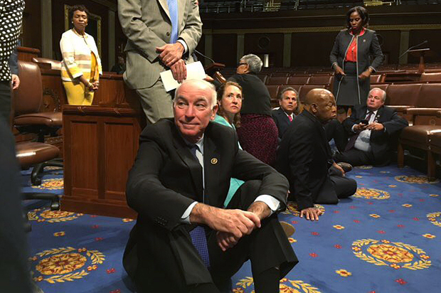 A photo shot and tweeted from the floor by U.S. Rep. John Yarmuth shows Democratic members of the House staging a sit-in "to demand action on common sense gun legislation," June 22, 2016. (Reuters/U.S. Rep. John Yarmuth)