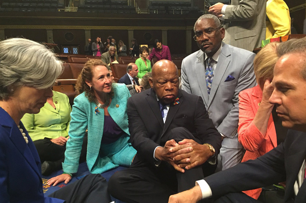 A photo tweeted from the House by Gregory Meeks shows Democratic members staging a sit-in "to demand action on common sense gun legislation," June 22, 2016. (Twitter/Gregory Meeks)