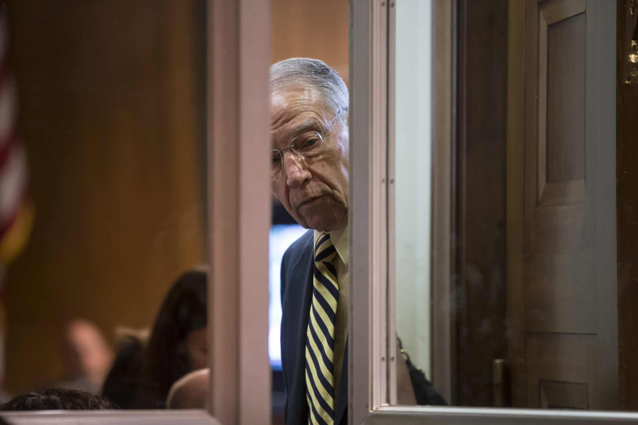 Senate Judiciary Committee Chairman Sen. Charles Grassley, R-Iowa, closes the door to a room where Homeland Security Secretary Jeh Johnson was monitoring reports of an active shooter at Joint Base Andrews, Md., prior to an appearance before the committee, Thursday, June 30, 2016, on Capitol Hill in Washington. (AP Photo/J. Scott Applewhite) (AP)